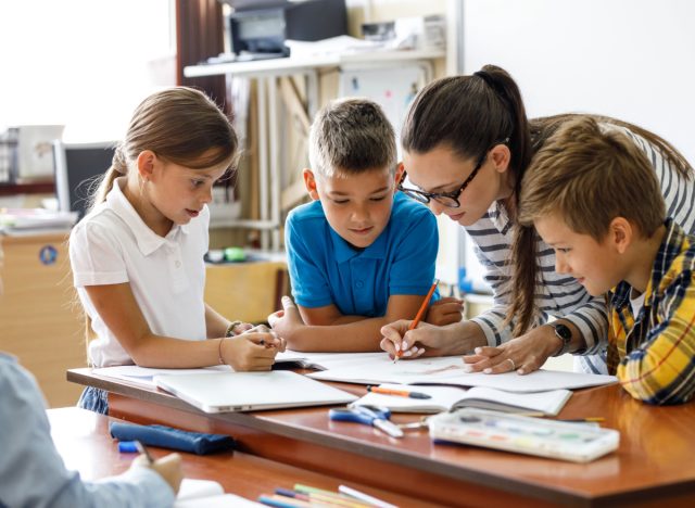 teacher with kids at school