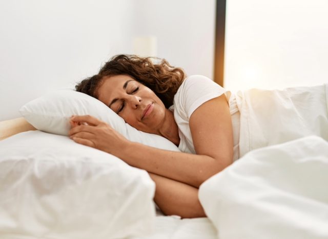 woman sleeping, concept of sleeping habit that's aging you faster