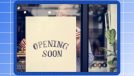 Photo of man hanging "opening soon" sign on a window against a blue background