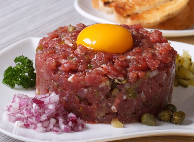tartare meat with egg yolk