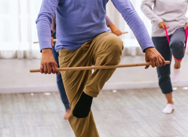 balancing exercise with stick