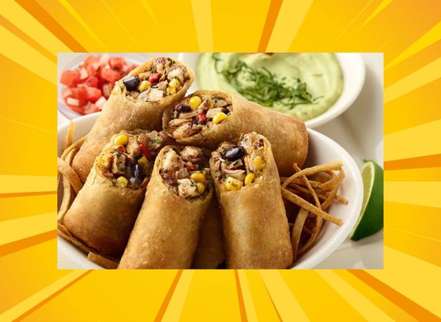 cheesecake factory tex-mex egg rolls on a plate against a bright designed yellow background