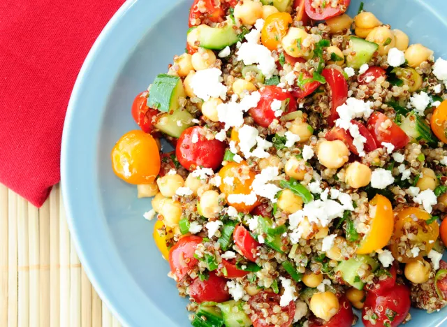 gluten free vegetarian salad made with quinoa, chickpeas, feta and fresh heirloom tomatoes