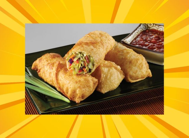 lao sze chuan egg rolls on a plate against a colorful designed yellow background.
