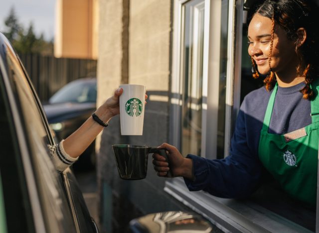 ordering with personal starbucks cup at the drive-thru