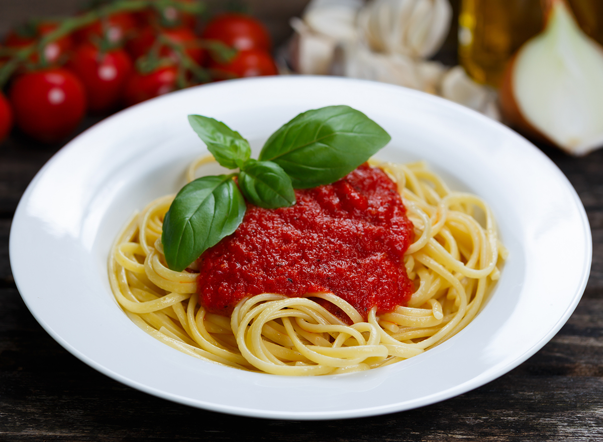 Spaghetti,With,Marinara,Sauce,And,Basil,Leaves,On,Top,,Decorated
