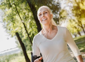 mature woman walking outdoors, concept of walking for weight loss