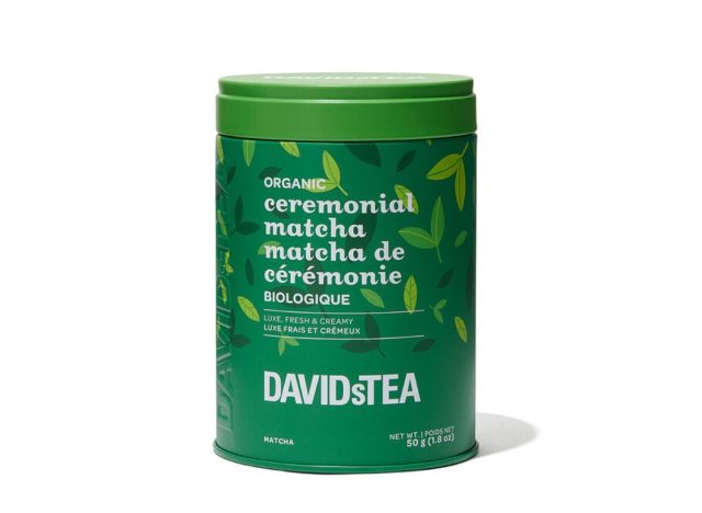 canister of matcha tea on a white background