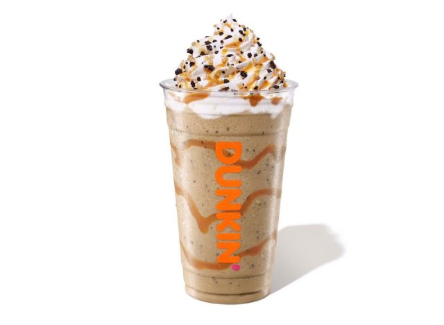 Dunkin' frozen coffee drink with whipped cream and crunchy toppings