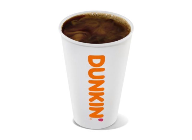 cup of Dunkin' coffee with cream on white background