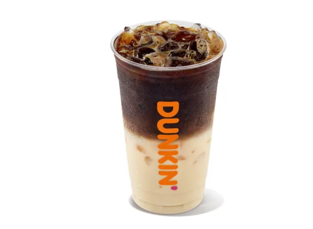 cup of iced macchiato from Dunkin' on a white background