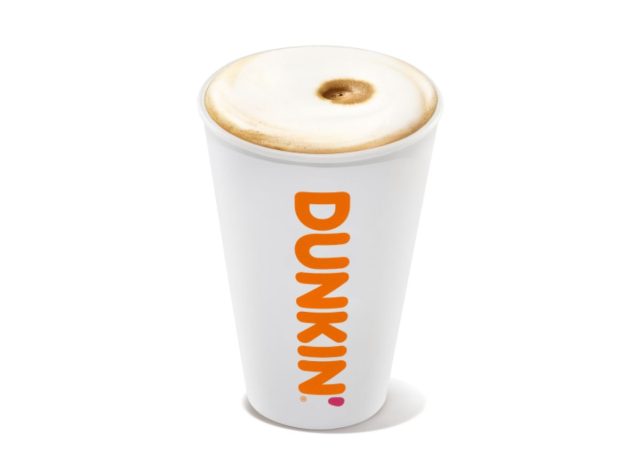 cup of Dunkin' Macchiato on a white background