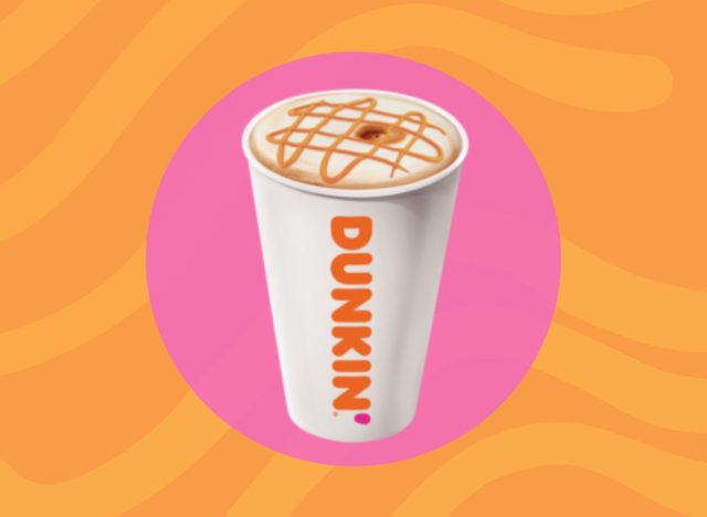 cup of Dunkin' macchiato with caramel drizzle 