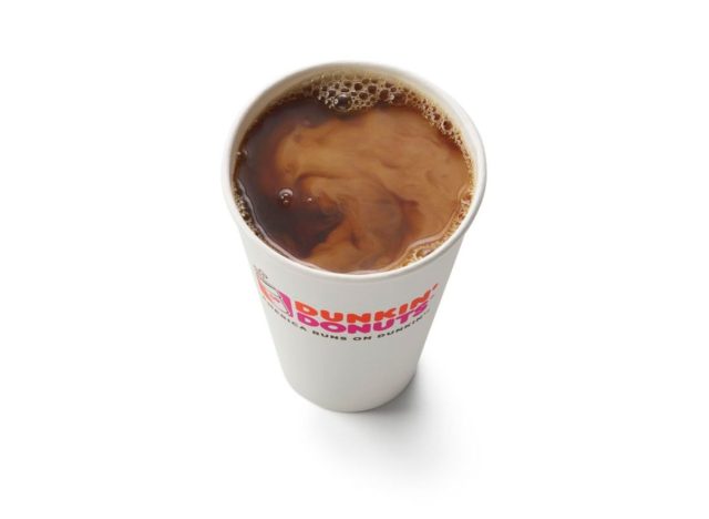 cup of dunkin' coffee with cream on white background