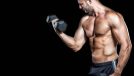 fit, muscular man lifting dumbbells, concept of hypertrophy workouts for bigger arms