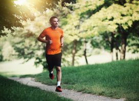 man running outdoors, concept of workouts to boost endurance and stamina