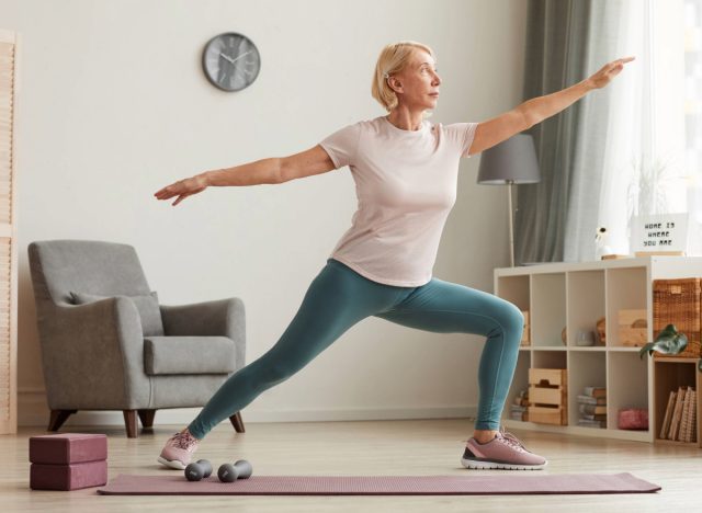 mature woman balance exercise, concept of daily balance workout to stay mobile as you age