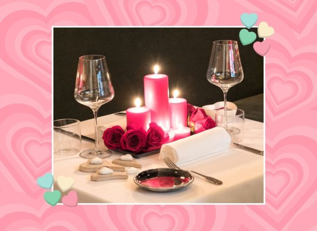 a photo of a romantic dinner tablescape on a designed pick background with hearts