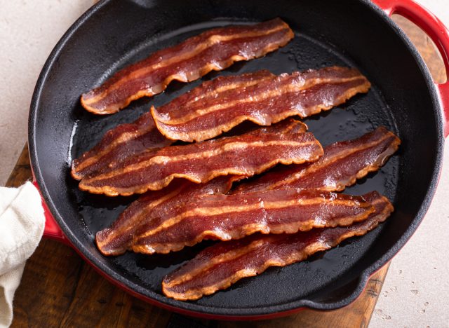 turkey bacon in a cast iron skillet