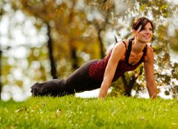 woman doing pushups, concept of floor workouts for lean upper body