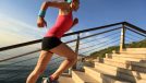 woman doing stair sprints outdoors, concept of high-intensity cardio exercises for weight loss
