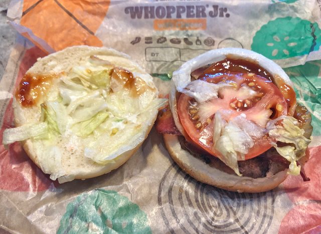 Burger King BBQ Bacon Whopper open faced atop its wrapper