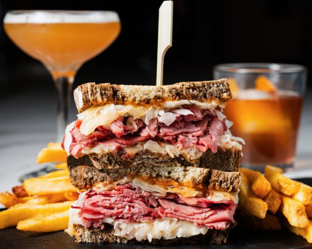 Reuben sandwich with fries at Bar Louie restaurant