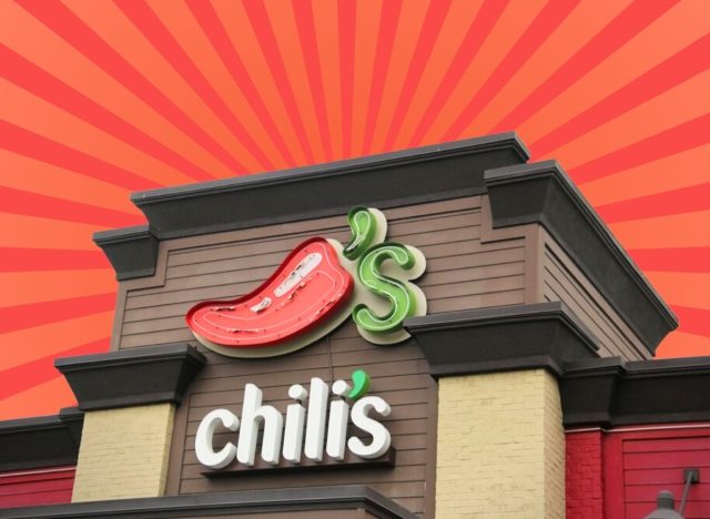 front of Chili's restaurant on red striped background