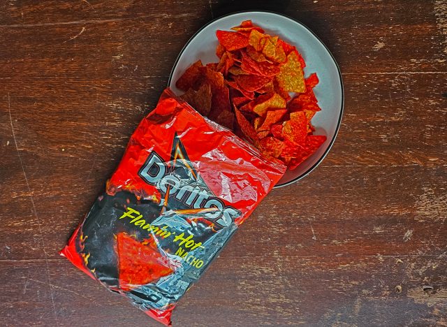 doritos flamin hot nachos in a bag and bowl.