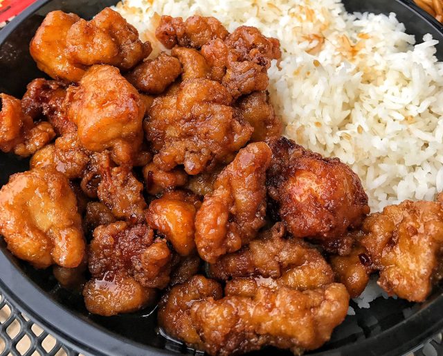 A bowl of orange chicken and rice at Pick Up Stix restaurant