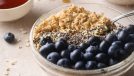 bowl of protein oats wiht blueberries and chia seeds
