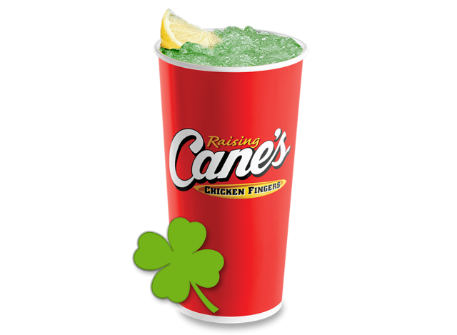 Green-colored Leprechaun Lemonade in a big red cup at Raising Cane's restaurant