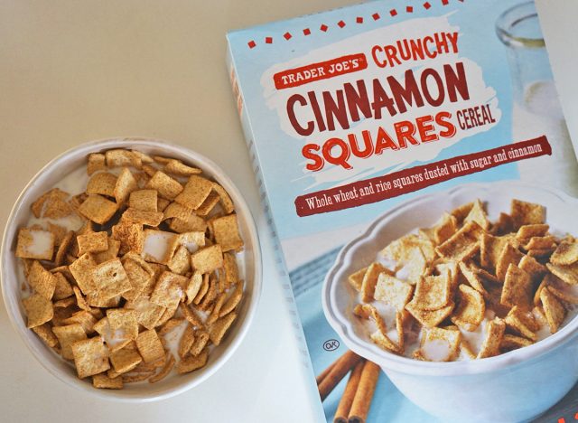trader joe's crunchy cinnamon squares cereal box and bowl.