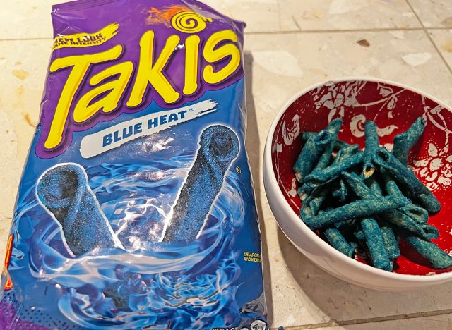 Takis blue heat rolled tortilla chips in a bowl and bag