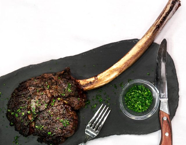 Prime Tomahawk steak at Fleming's Prime Steakhouse & Wine Bar