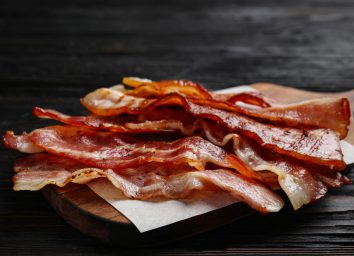 bacon strips on a wooden board