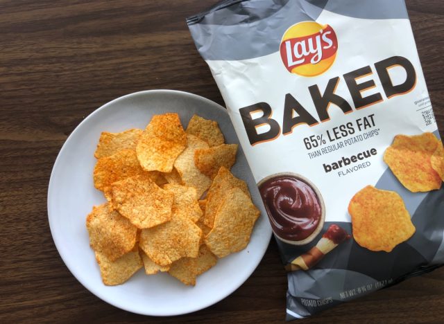 baked lays potato chips in a bag and on a plate.