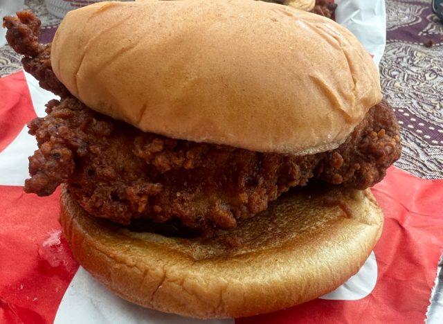 chick-fil-a spicy chicken sandwich in a takeout container.