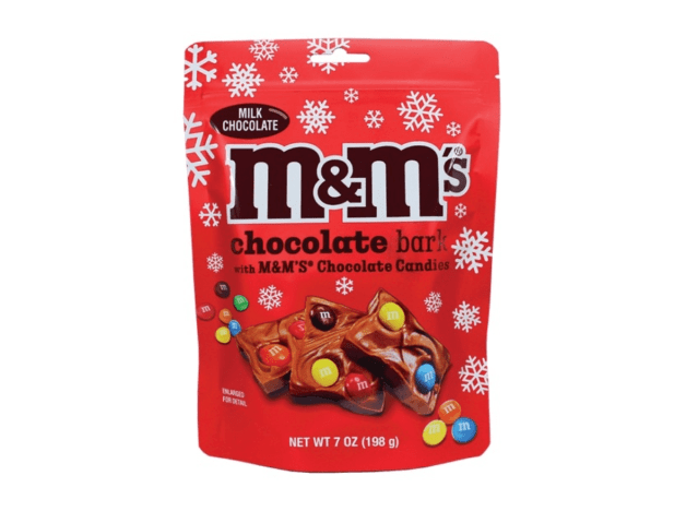 a bag of chocolate bark m&m's on a white background.