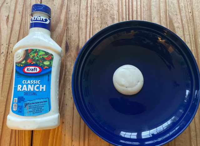 kraft ranch bottle and a blue plate.
