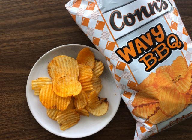 conn's wavy bbq chips in a bag and on a plate.