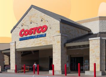 Costco storefront in front of yellow and orange design backdrop