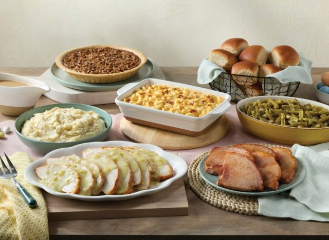cracker barrel's new easter ham and turkey hot n' ready family dinner, featuring side dishes, rolls, and pie