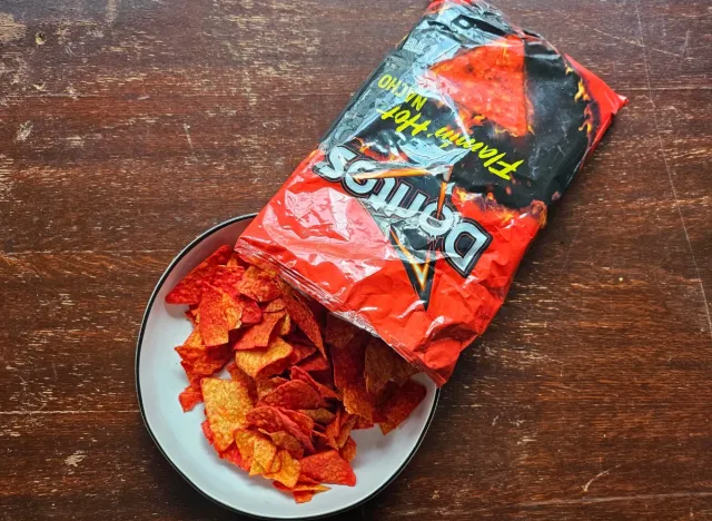 doritos flamin hot nachos in a bag and bowl.
