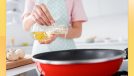 woman pouring a cooking oil into a pan