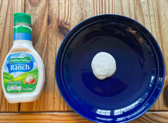 hidden valley ranch bottle and a blue plate.