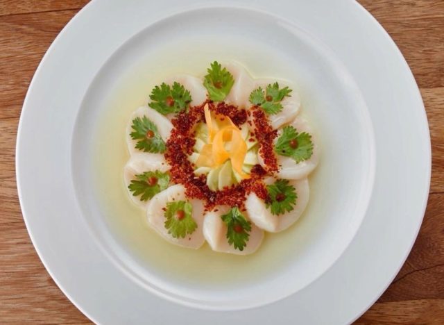 nobu scallops arranged on a plate.