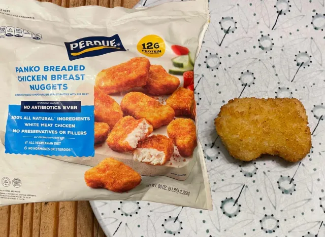 perdue nuggets bag next to a plate with a nugget.