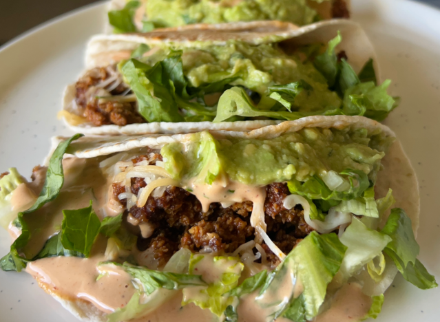 qdoba beef tacos on a plate.