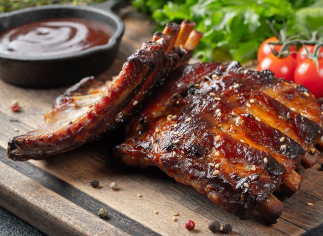 plate of ribs with sauce